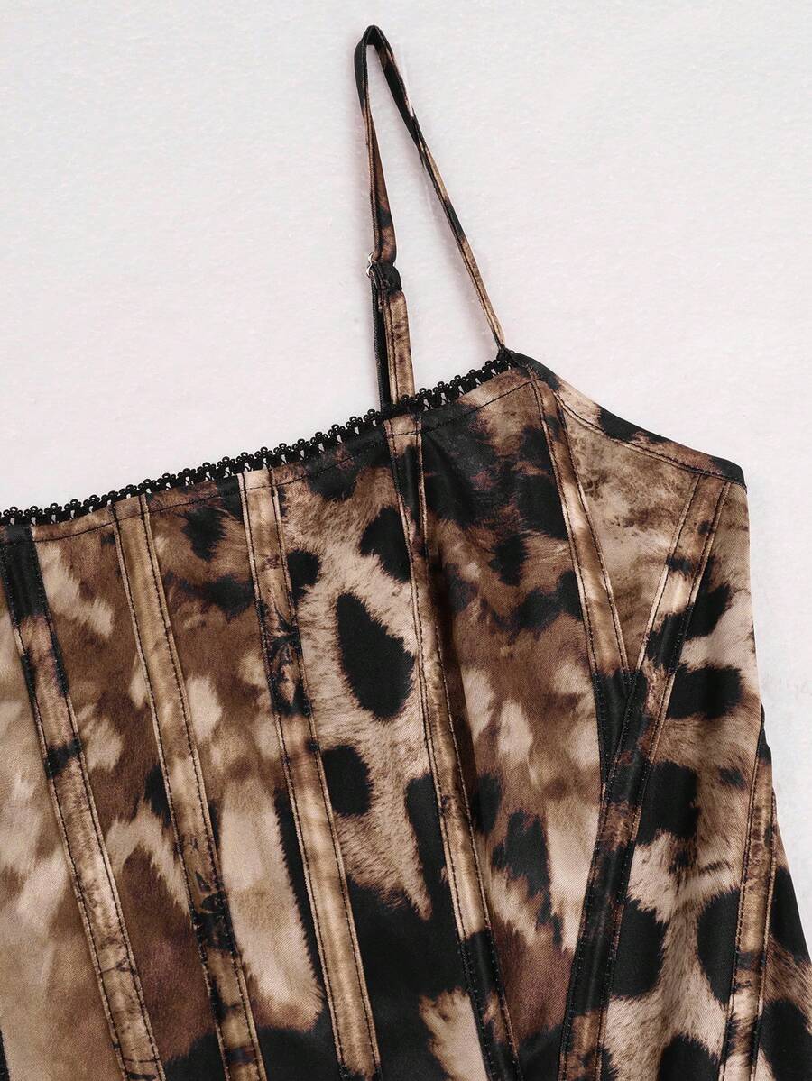 Women's brown leopard print corset top featuring spaghetti straps, boning structure, asymmetrical cropped hem, and lace-up backless detail.