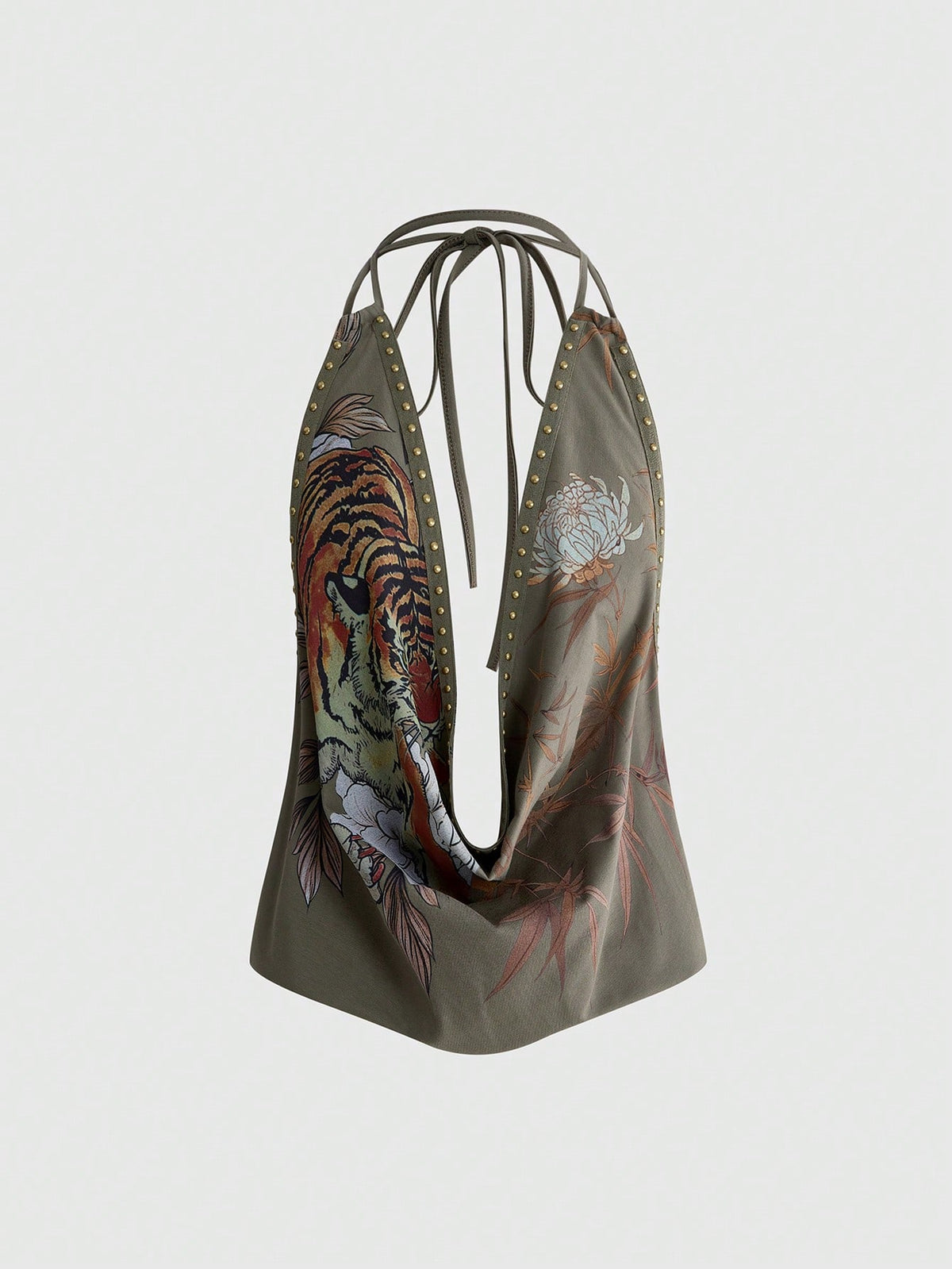 Front view of women's black halter tank top featuring graphic print, rhinestone embellishments, and a backless tie-back design.