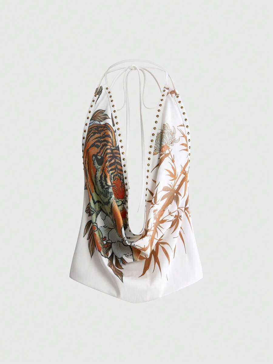 Front view of women's black halter tank top featuring graphic print, rhinestone embellishments, and a backless tie-back design.