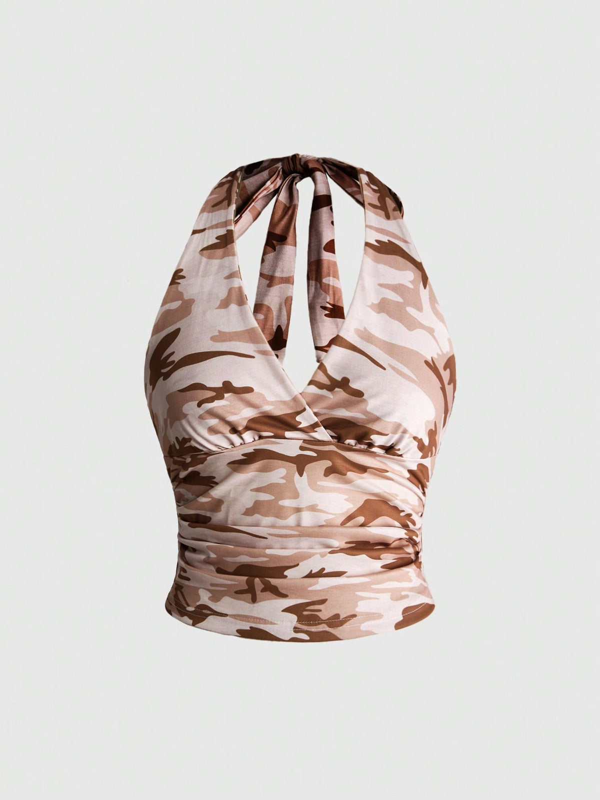 Women's halter crop tank top featuring a backless silhouette and ruched detailing in a slim fit design.