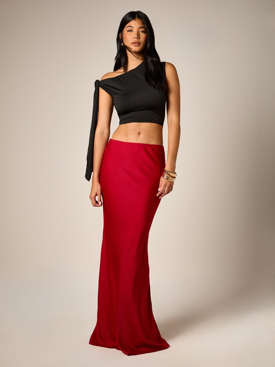 Red satin maxi skirt for women featuring an elegant mid-waist mermaid fit and flared hem