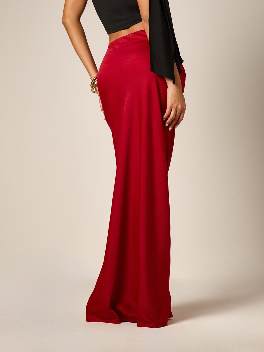 Red satin maxi skirt for women featuring an elegant mid-waist mermaid fit and flared hem