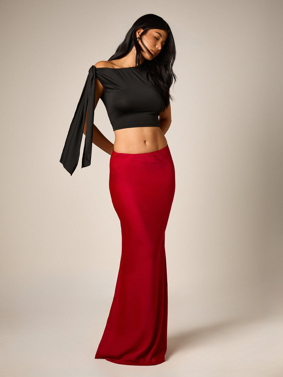 Red satin maxi skirt for women featuring an elegant mid-waist mermaid fit and flared hem