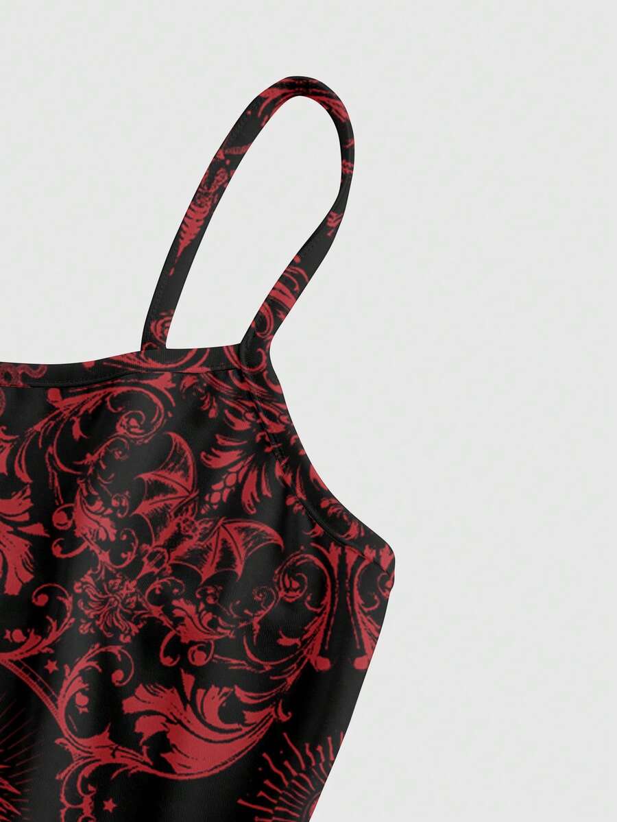 Women wearing a black gothic skull print backless cami mini dress with spaghetti straps and lettuce trim hem.
