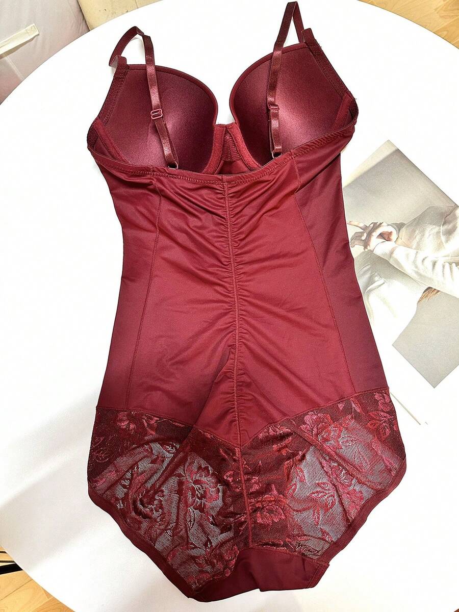 Women's lace shapewear bodysuit with tummy control, built-in bra cup pads, waist shaping, and three-row snap crotch in a bodycon fit.