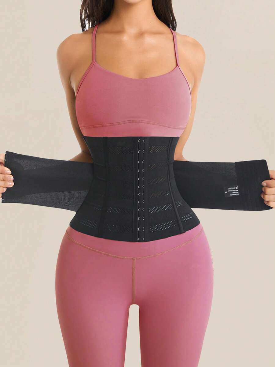 Black double belt wrap waist trainer corset shapewear for women with strong tummy control and button front design.