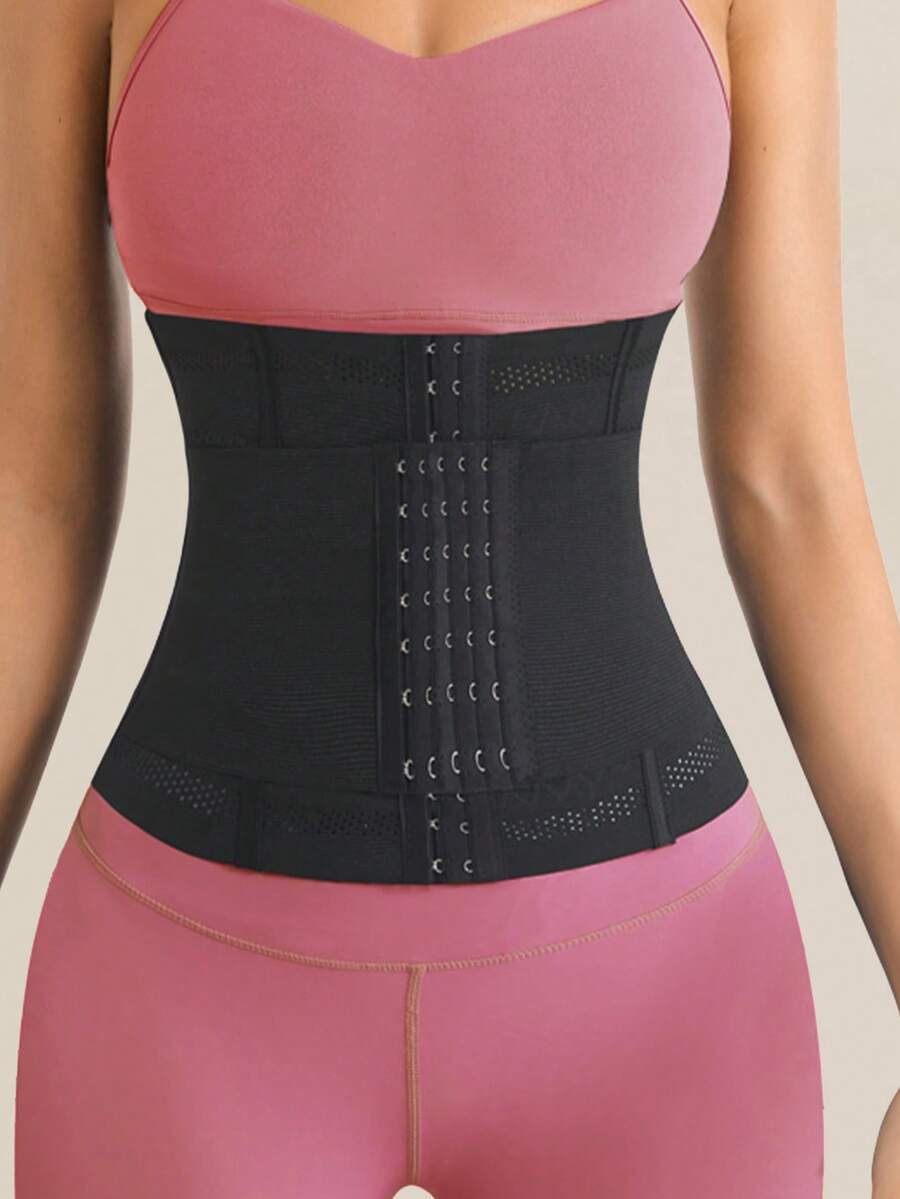 Black double belt wrap waist trainer corset shapewear for women with strong tummy control and button front design.