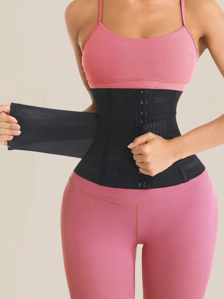 Black double belt wrap waist trainer corset shapewear for women with strong tummy control and button front design.
