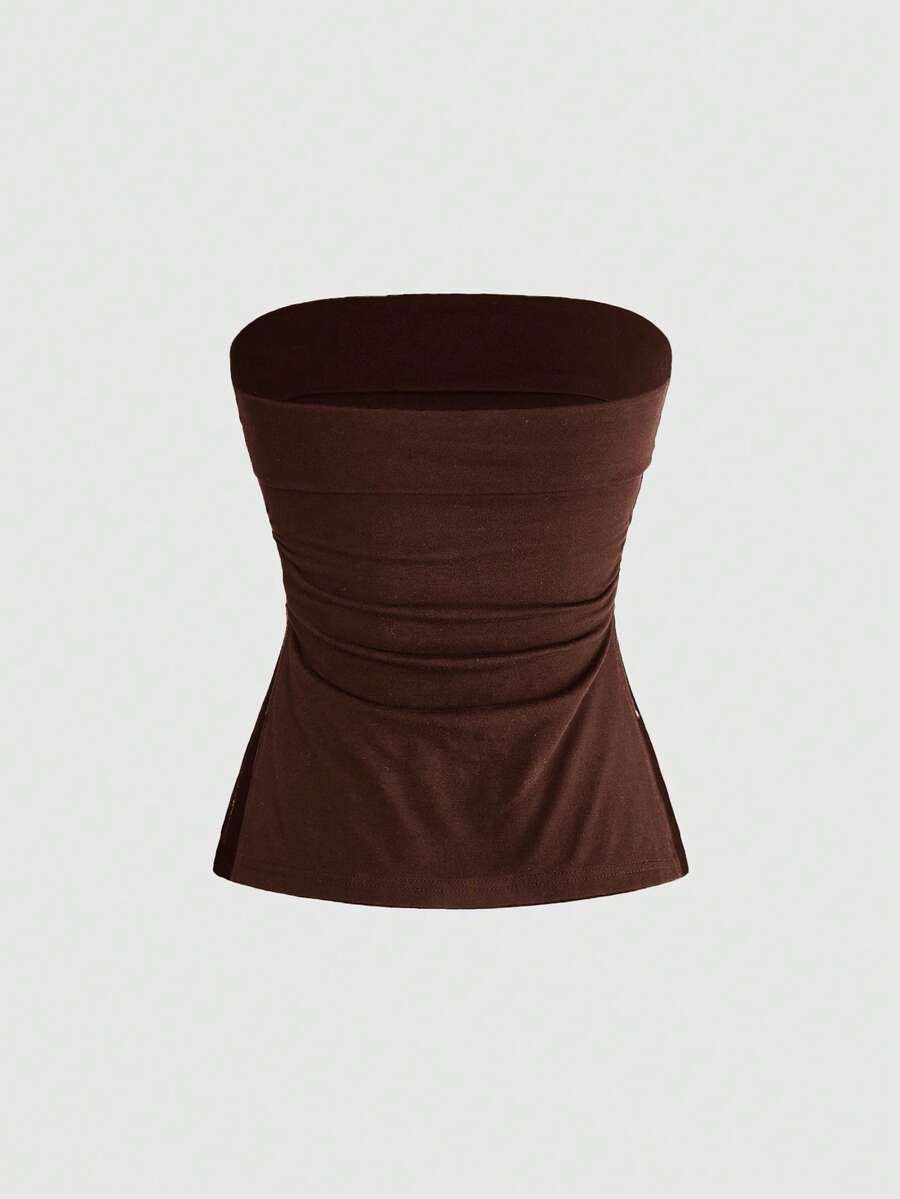 Women's black cropped strapless camisole top with ladybug embroidery and rhinestone details.