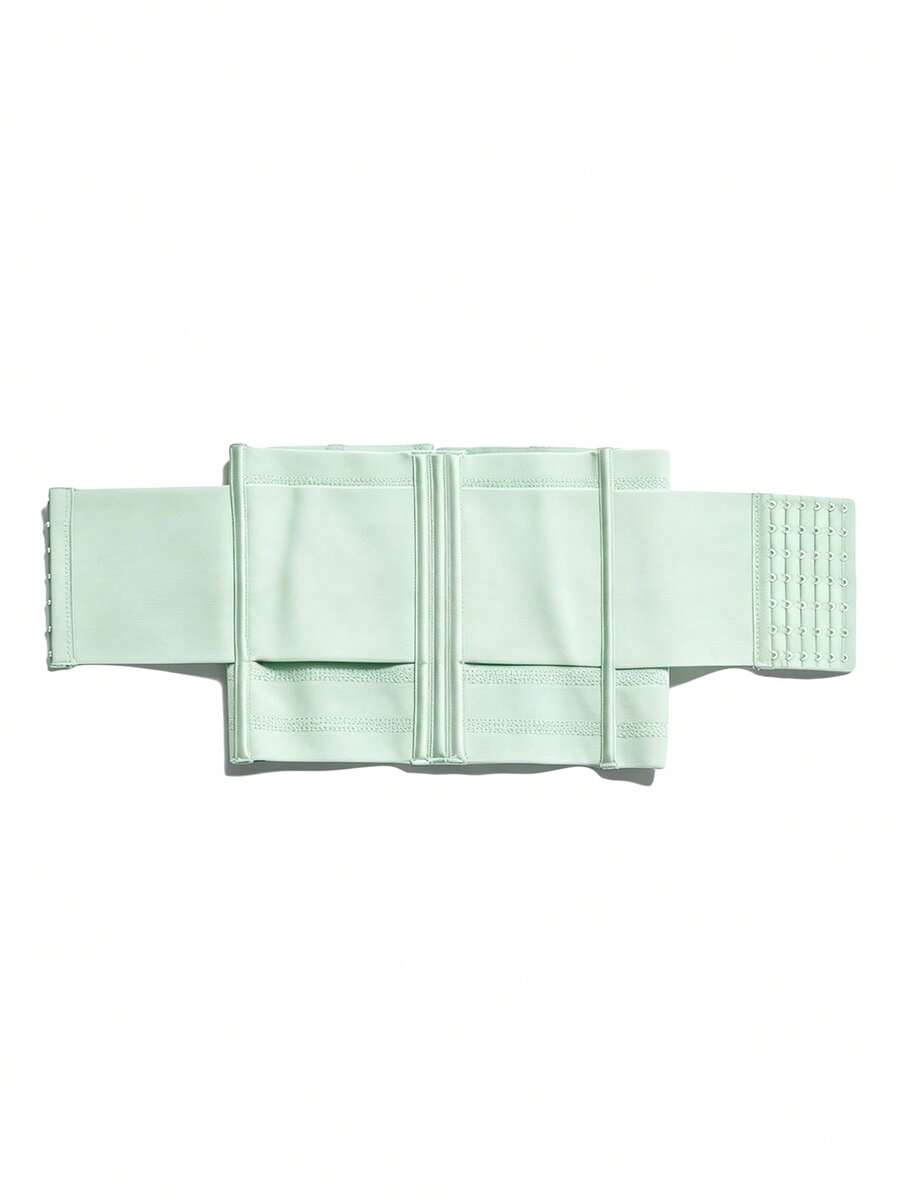 Black adjustable waist cincher shapewear for women made of high stretch knitted fabric for tummy and waist control.
