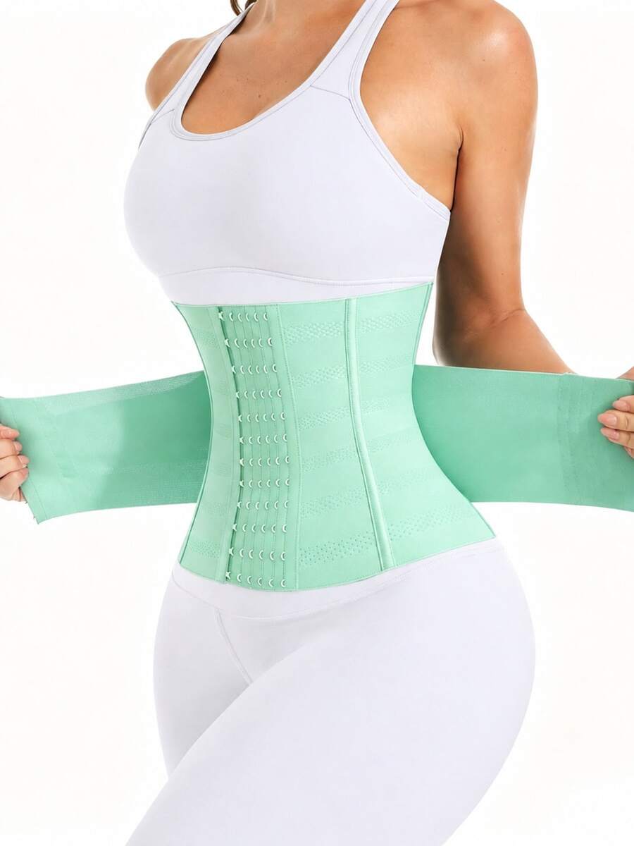 Black adjustable waist cincher shapewear for women made of high stretch knitted fabric for tummy and waist control.