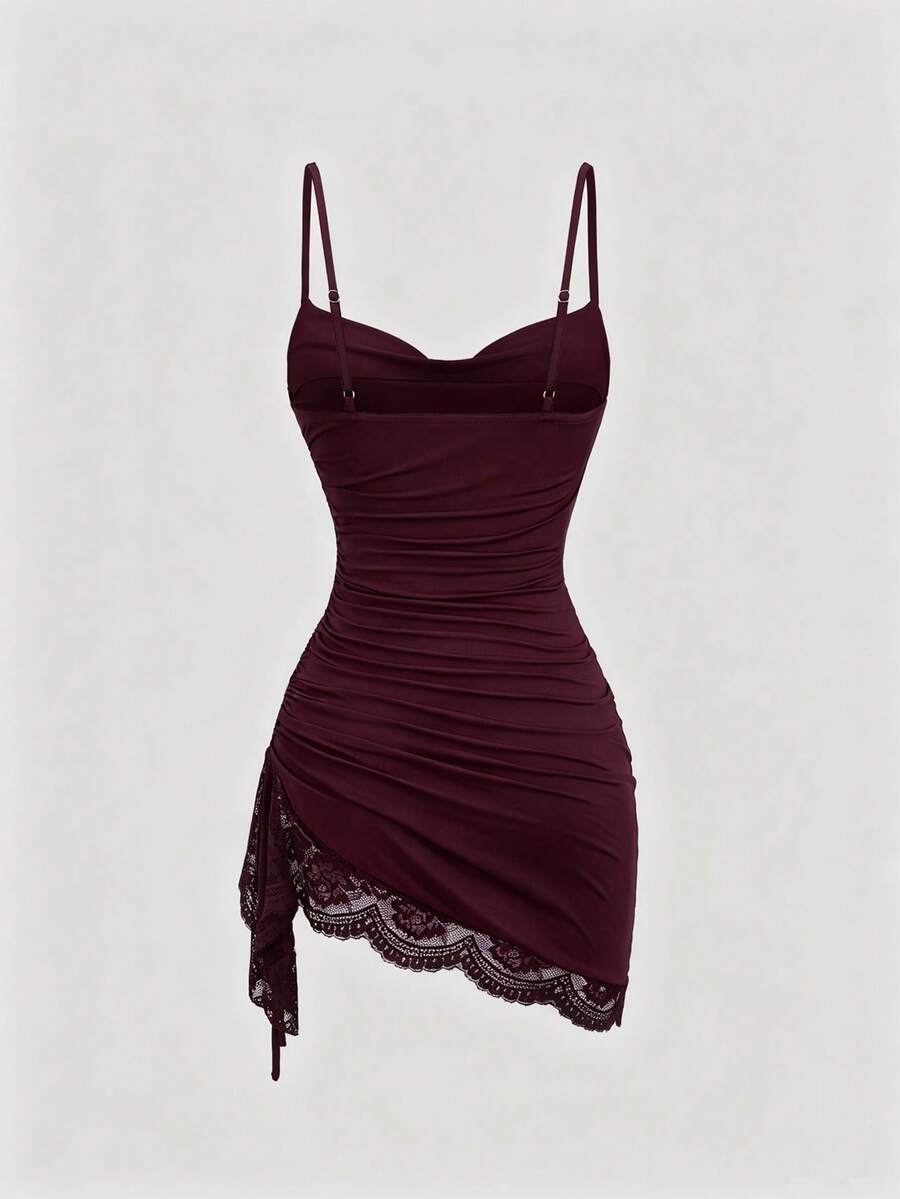 Women's coffee cowl neck cami dress with contrast lace patchwork, spaghetti straps, and an asymmetrical hem.