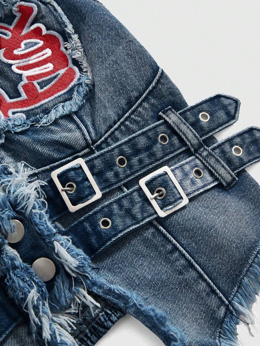 Women's denim halter crop top featuring a backless design, asymmetrical hem, single-breasted front, and lettuce trim.