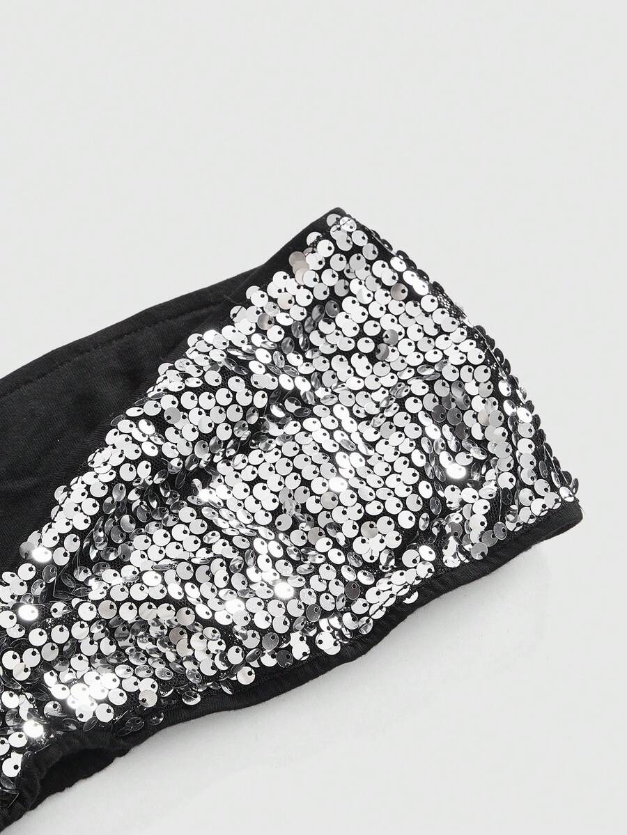 Women's black sequin halter tank top featuring a draped cowl neck and backless design