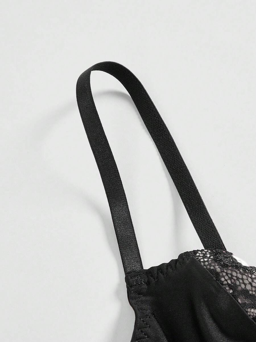 ROMWE women's black Goth Y2K contrast lace spaghetti strap cami crop top featuring bow details and waist tie decor.