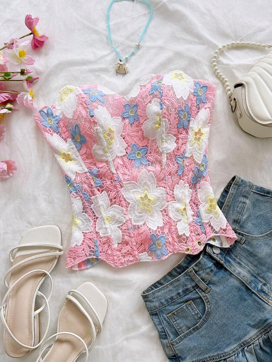 Strapless floral lace corset top with lace-up detail, asymmetrical hem, and slim fit for women.