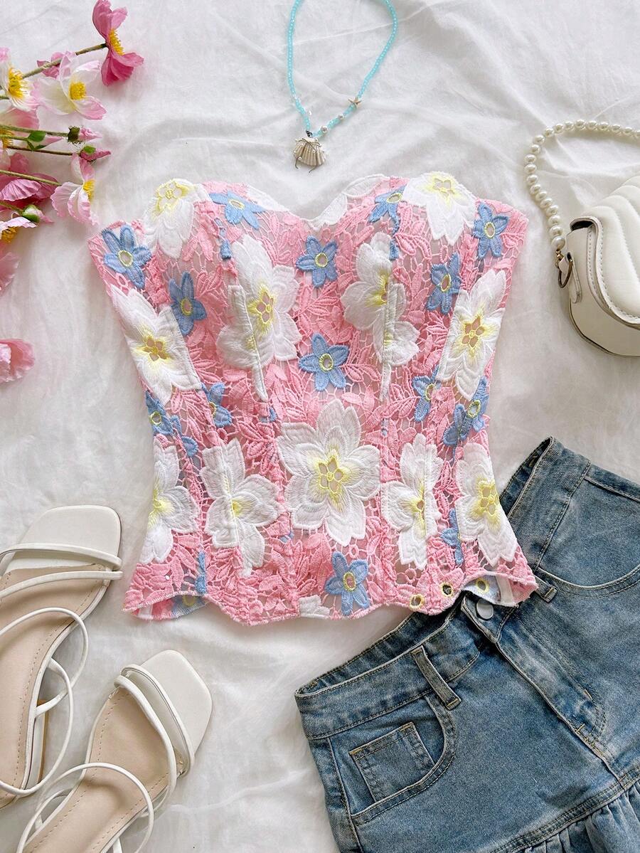Strapless floral lace corset top with lace-up detail, asymmetrical hem, and slim fit for women.