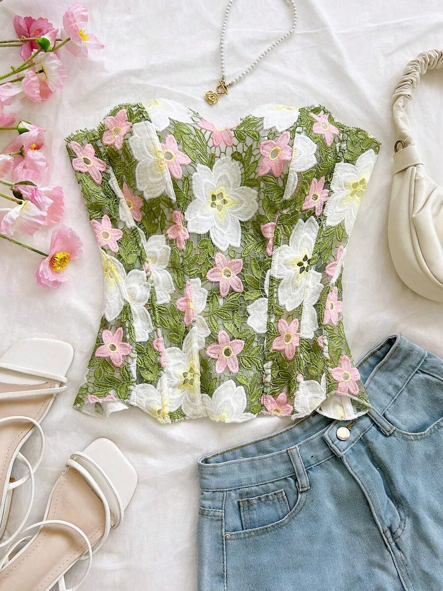 Strapless floral lace corset top with lace-up detail, asymmetrical hem, and slim fit for women.