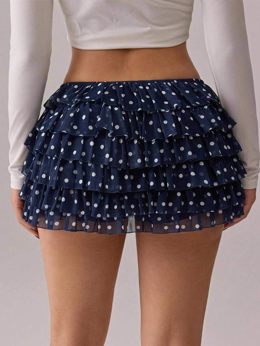 Apricot tiered lace ruffle hem low waist shorts for women featuring elastic waist and lined semi-sheer knit fabric.