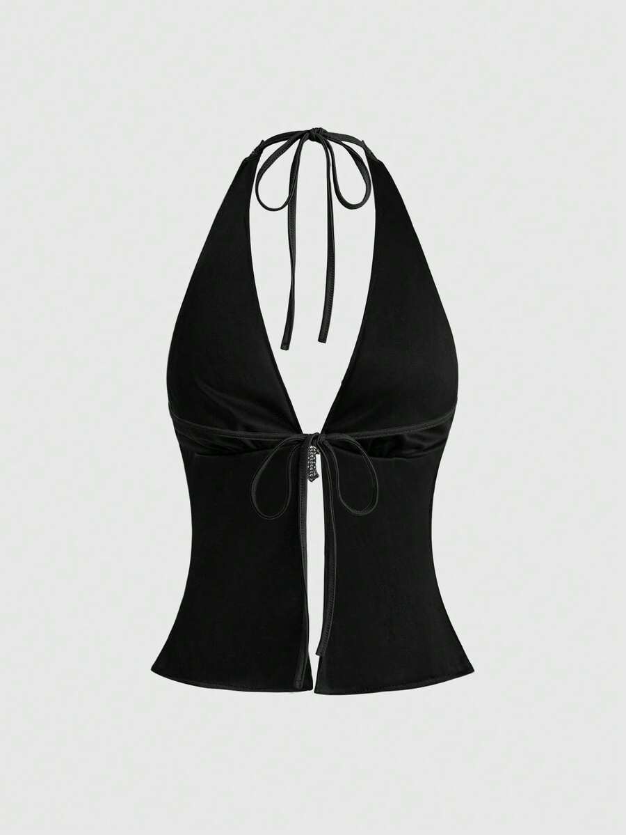 Women's sequin halter tank top featuring a backless slim fit design with knot and split details.