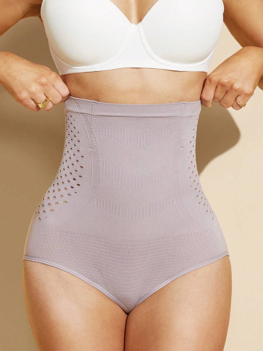 Black women's high waist seamless shaping jumpsuit featuring tummy control and short body shaper design.