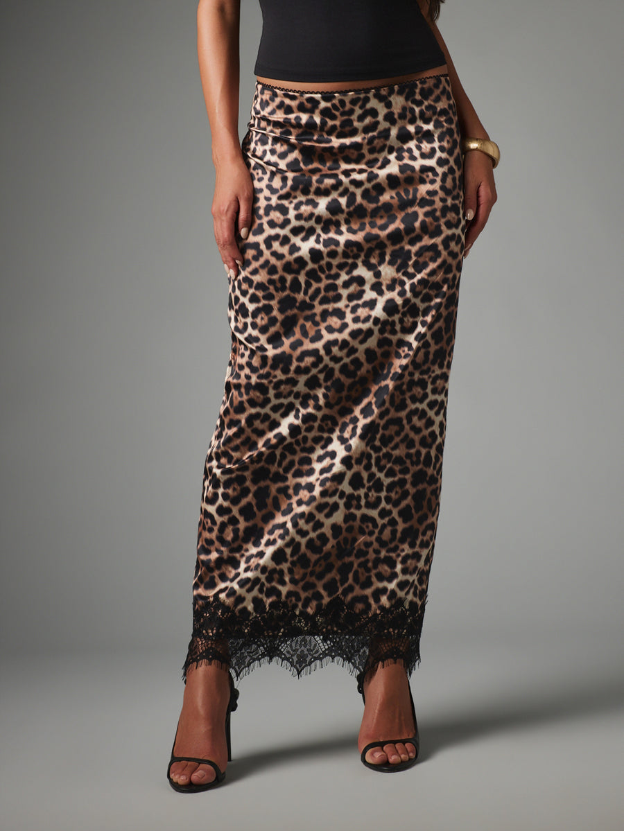 Brown leopard print satin maxi skirt with black lace hem trim and slip style design for women.