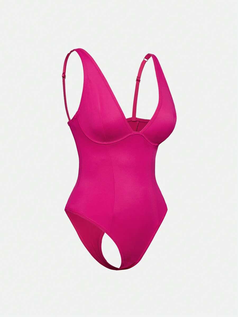 Apricot backless shapewear bodysuit with thong cut, cup details, and high-stretch fabric for light tummy support.