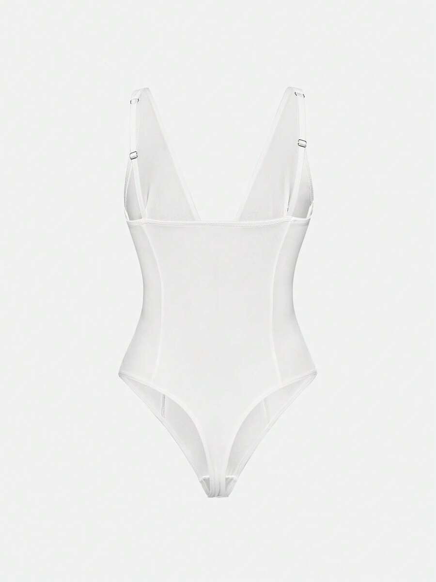 Apricot backless shapewear bodysuit with thong cut, cup details, and high-stretch fabric for light tummy support.