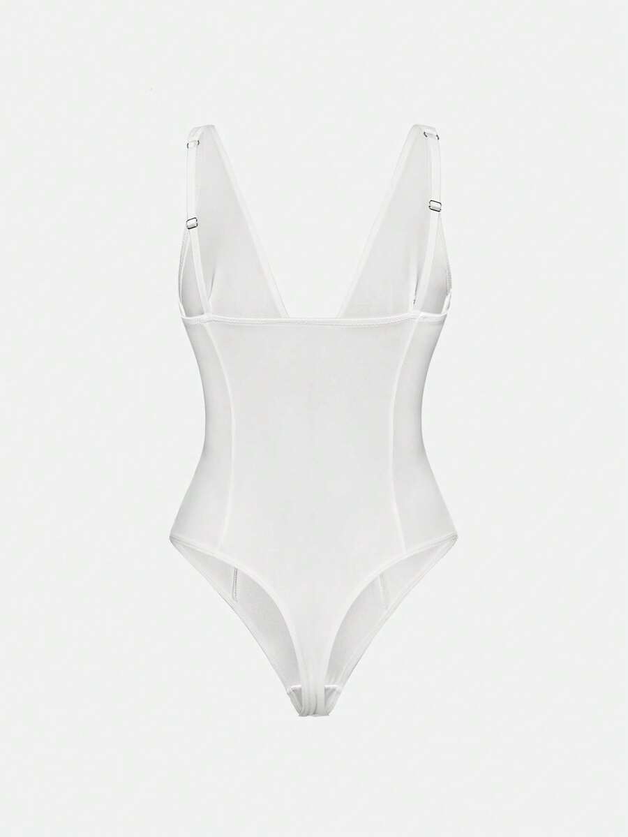 Apricot backless shapewear bodysuit with thong cut, cup details, and high-stretch fabric for light tummy support.