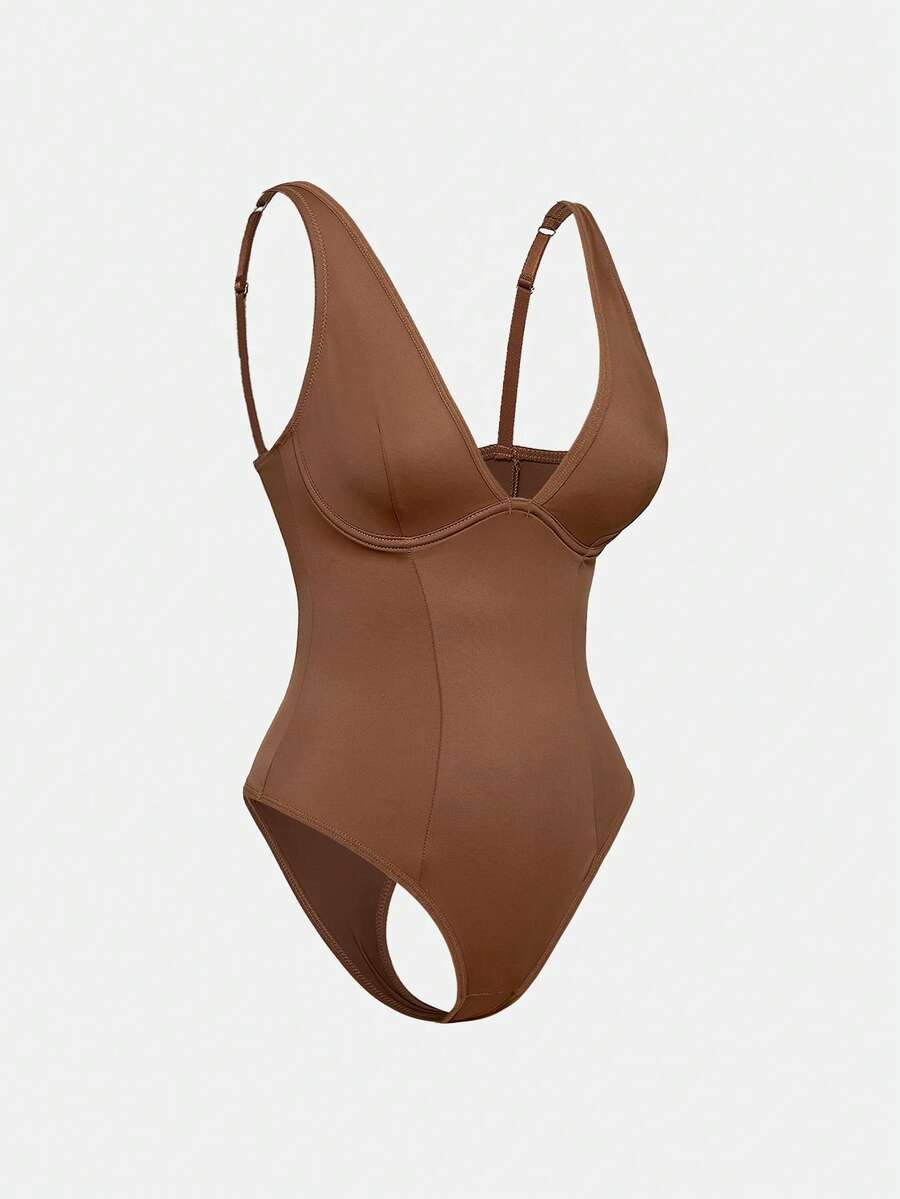 Apricot backless shapewear bodysuit with thong cut, cup details, and high-stretch fabric for light tummy support.