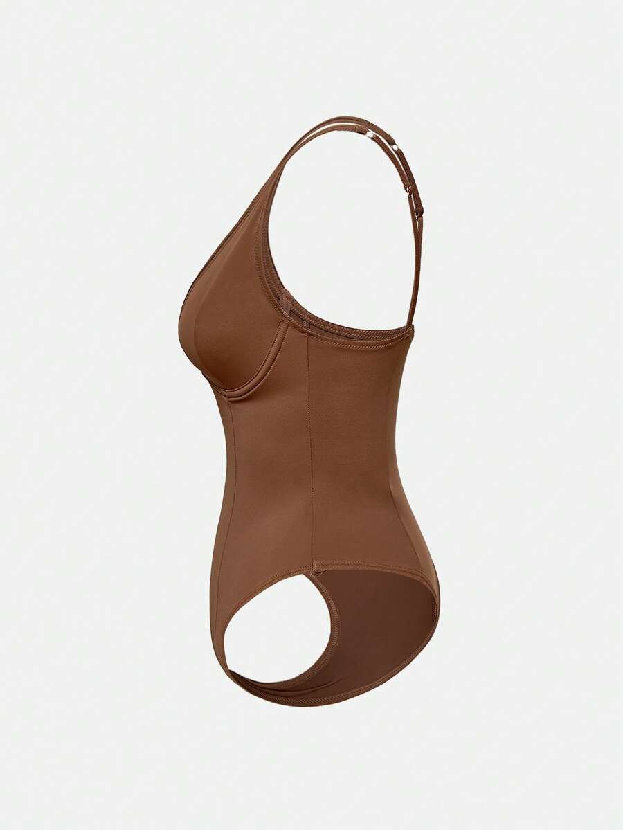 Apricot backless shapewear bodysuit with thong cut, cup details, and high-stretch fabric for light tummy support.