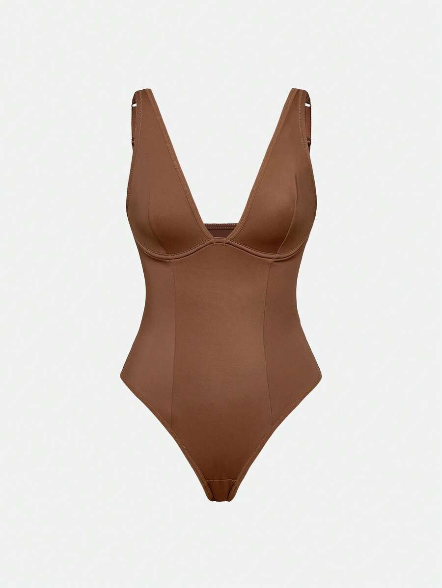 Apricot backless shapewear bodysuit with thong cut, cup details, and high-stretch fabric for light tummy support.