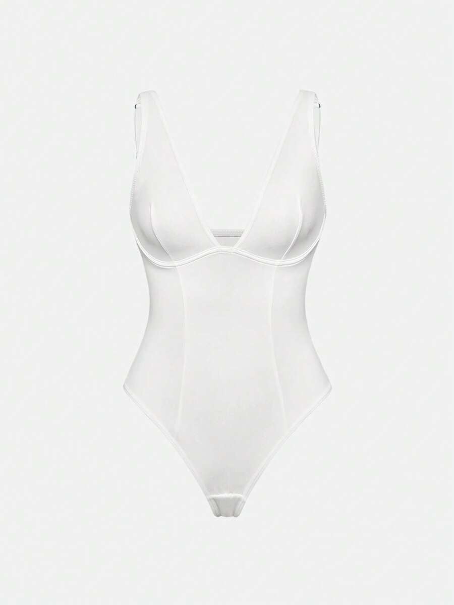 Apricot backless shapewear bodysuit with thong cut, cup details, and high-stretch fabric for light tummy support.
