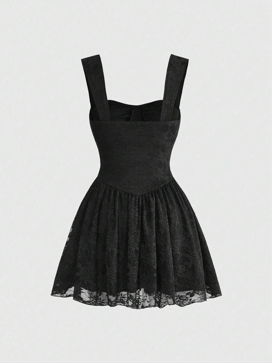 Front view of a women's black lace goth cami mini dress with shoulder straps, high waist flared hem, and matching lace arm sleeves.