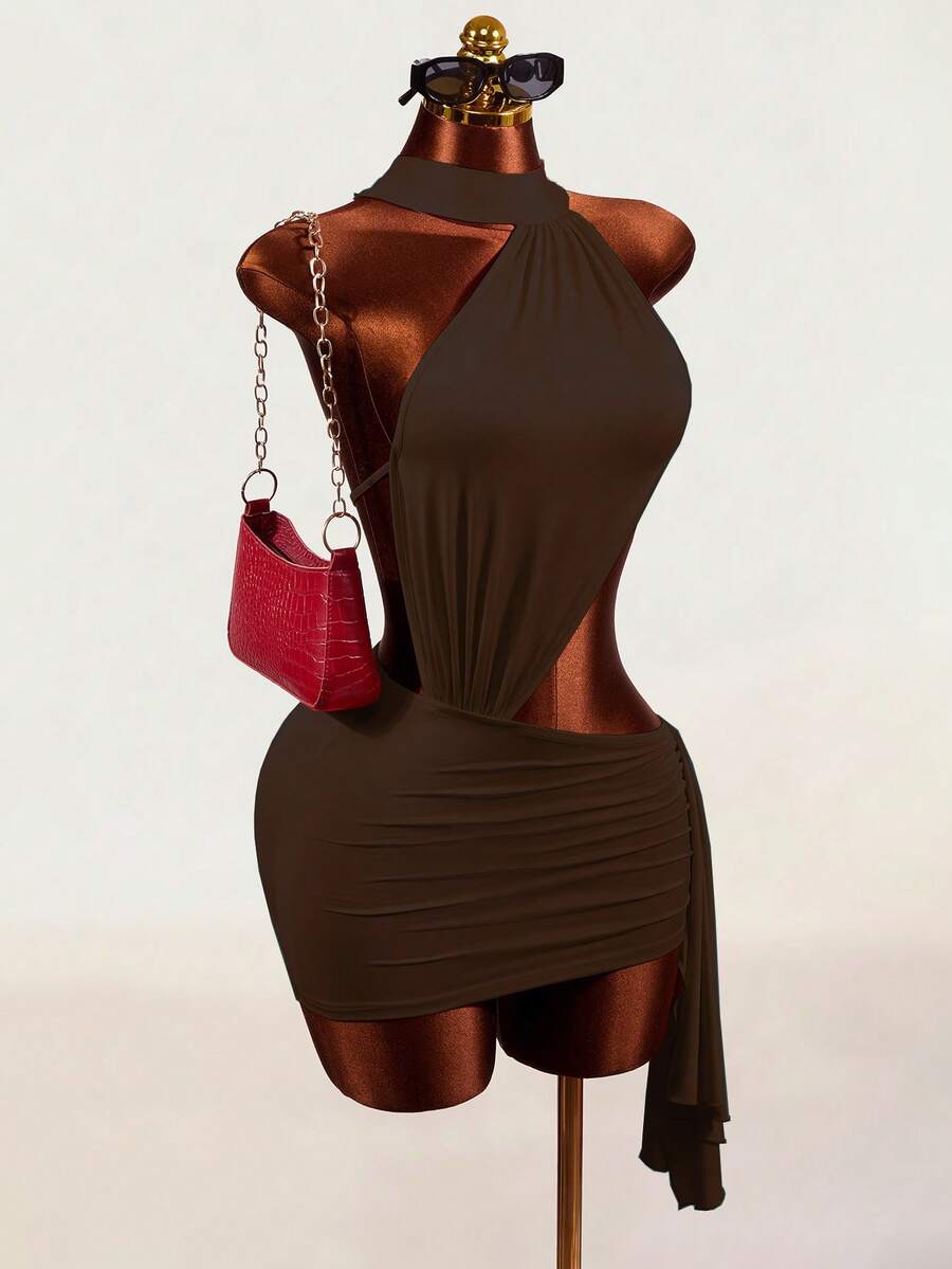 Women's black halter hollow out mini bodycon dress featuring backless asymmetrical knot details and a slim pencil fit.
