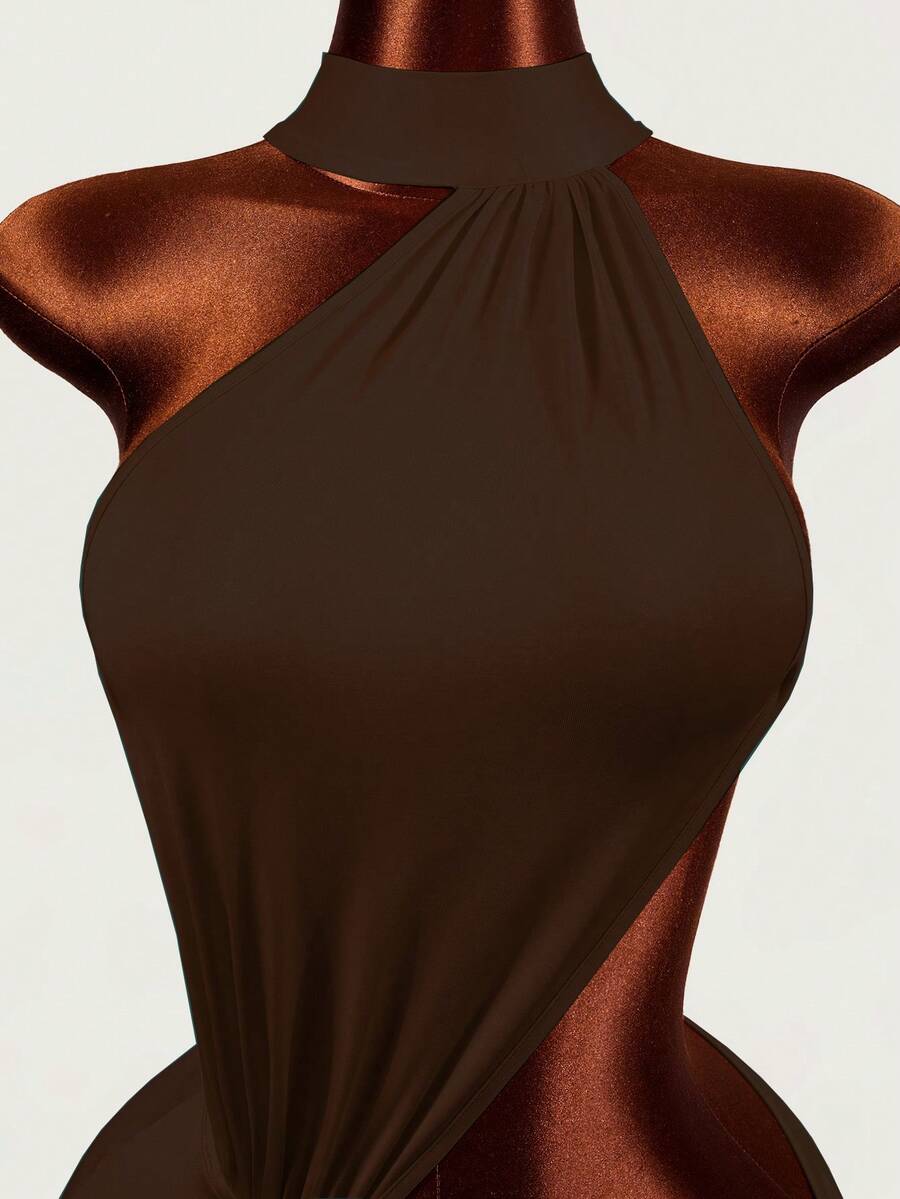 Women's black halter hollow out mini bodycon dress featuring backless asymmetrical knot details and a slim pencil fit.