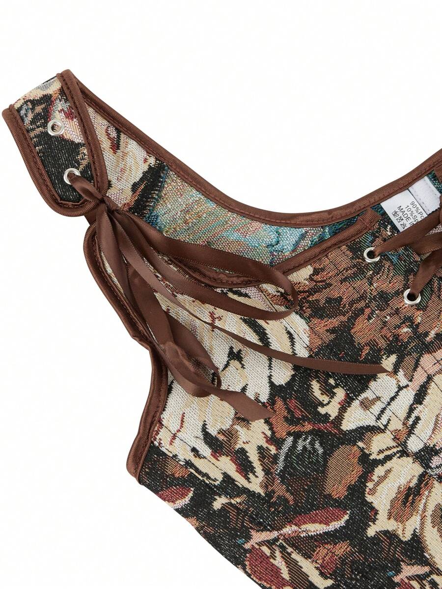 Women's retro floral print bustier top with shoulder straps, lace-up tie back, zipper, and boned construction in a romantic vintage style.