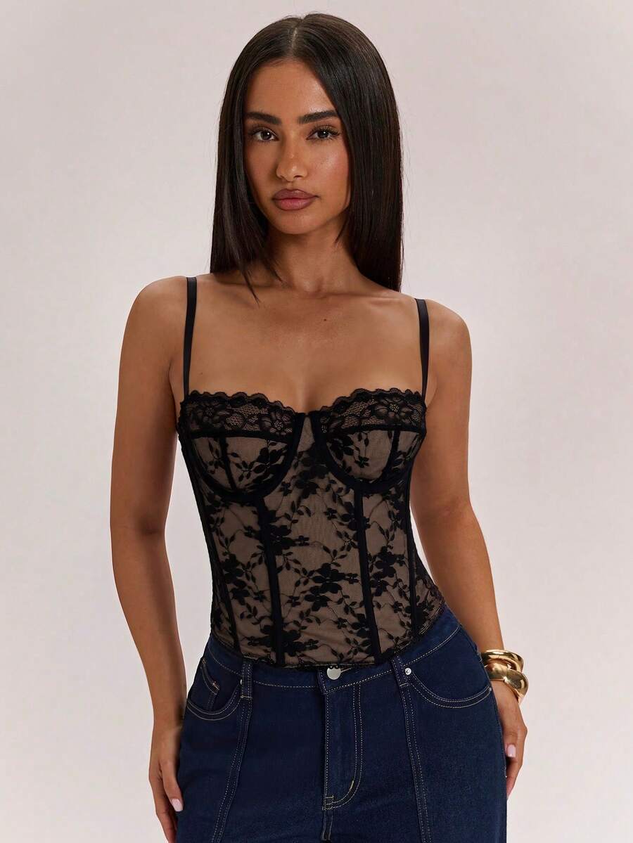 Women’s camisole top with cup detail, spaghetti straps, lined body, and slim fit design in knitted fabric with an asymmetrical hem.