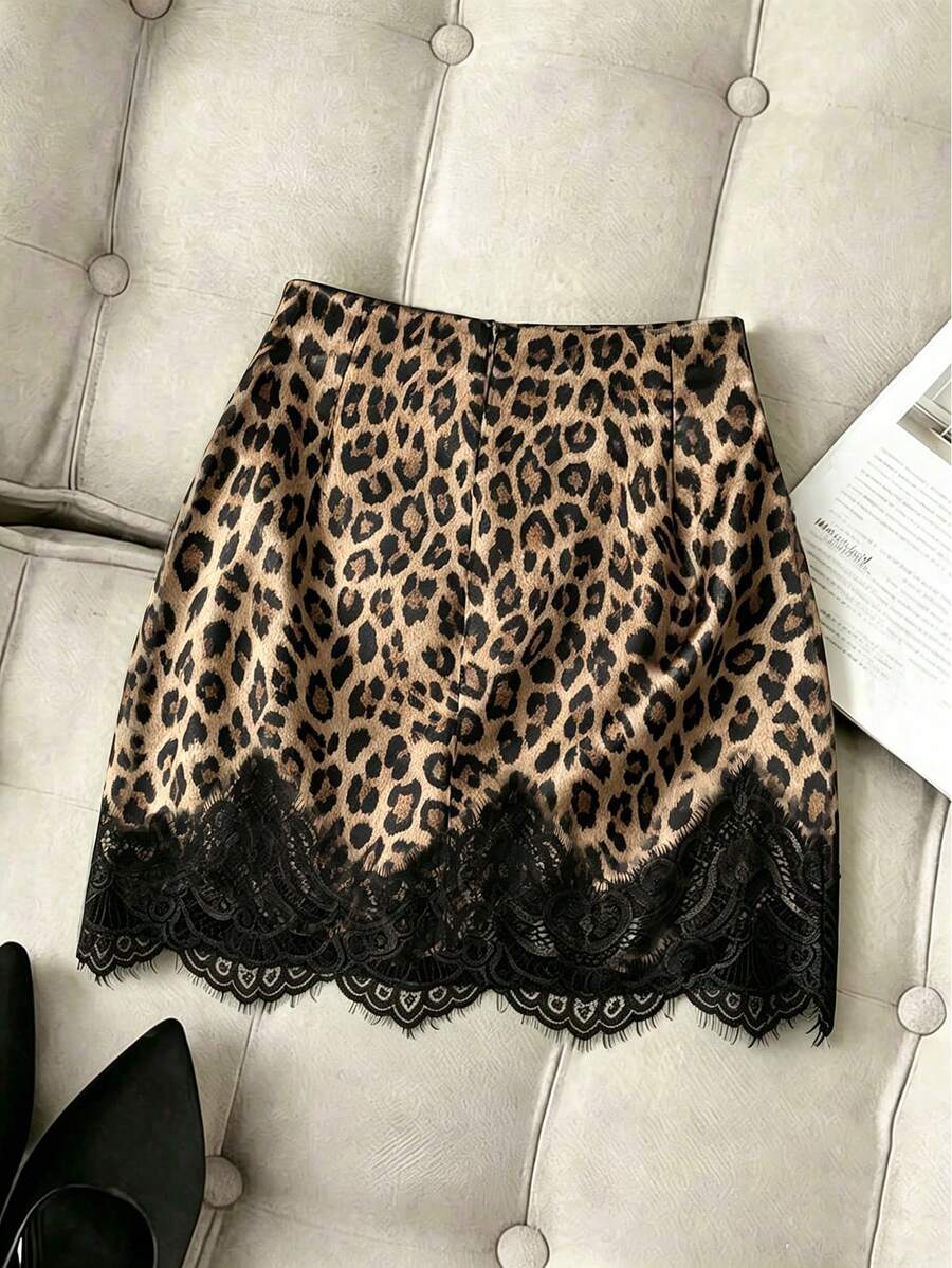 Women's brown leopard print bodycon mini skirt featuring black contrast lace trim around the hemline.