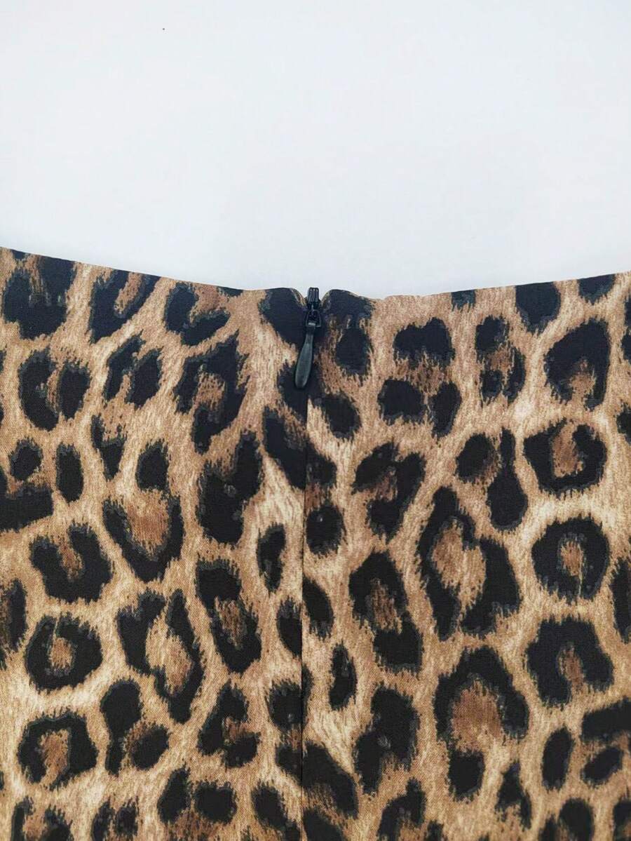 Women's brown leopard print bodycon mini skirt featuring black contrast lace trim around the hemline.