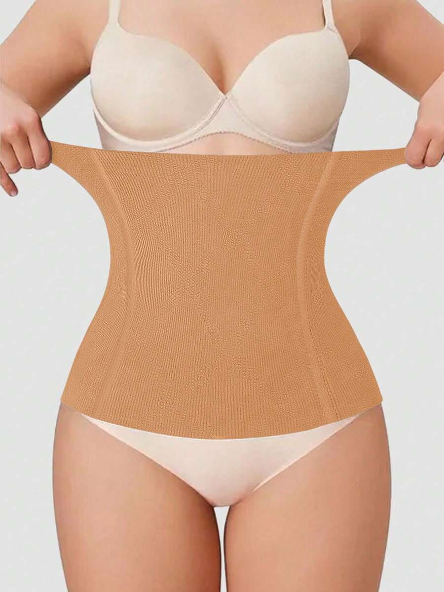 Black women's seamless waist cincher belt for waist support and daily wear.