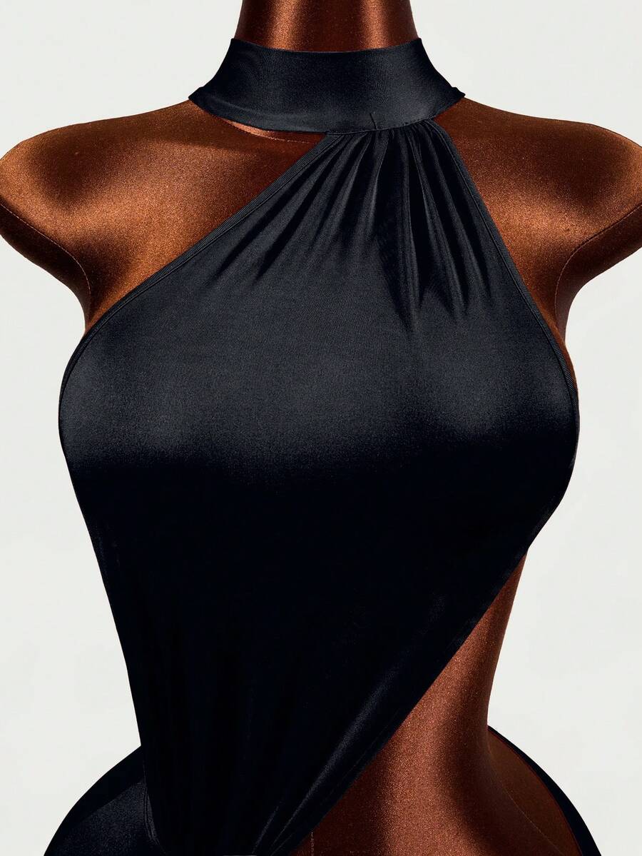Women's black halter hollow out mini bodycon dress featuring backless asymmetrical knot details and a slim pencil fit.