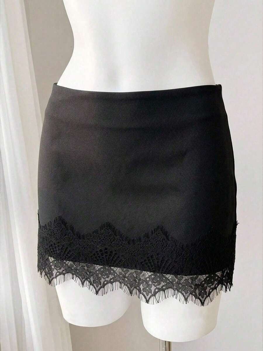 Women's low-waist black lace patchwork mini skirt with bodycon fit.