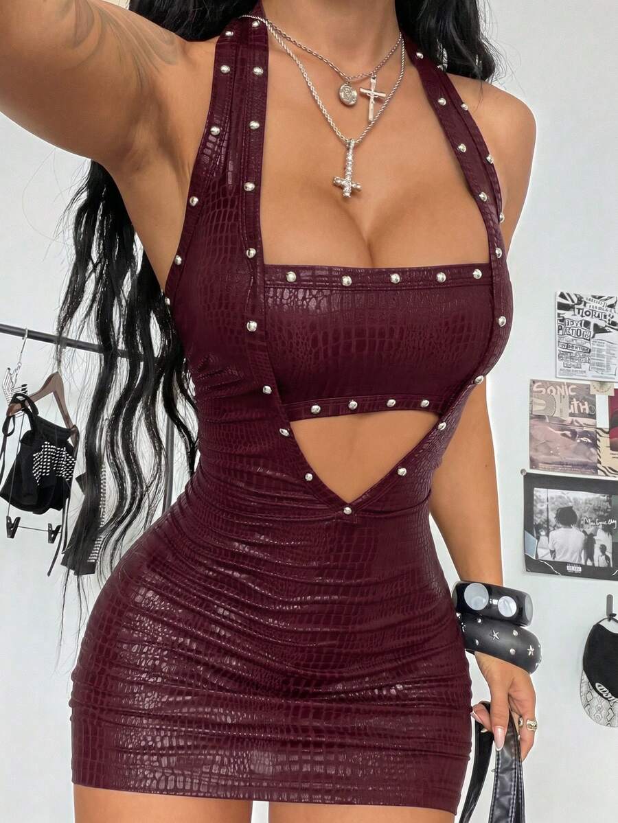 Women's black halter bodycon mini dress with studded rivet details in coated fabric