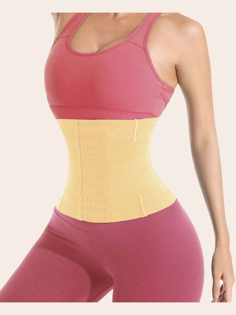 Black adjustable waist cincher shapewear for women made of high stretch knitted fabric for tummy and waist control.