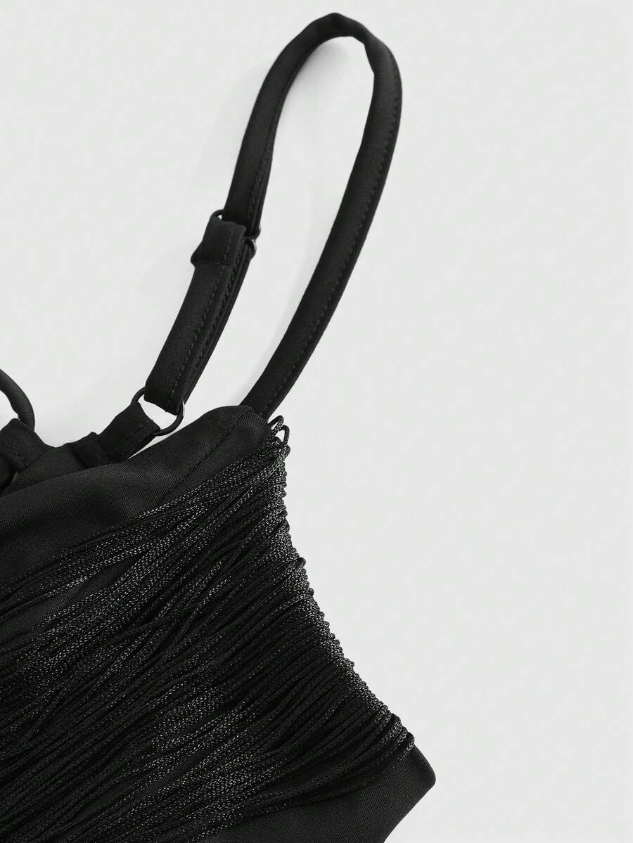 Black micro crop camisole bra featuring spaghetti straps, criss-cross ruched front detailing, and an asymmetrical hem.