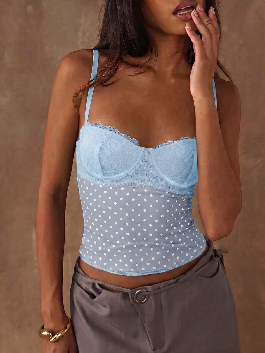 Women's black contrast lace camisole with spaghetti straps, cup detail, semi-sheer finish, and slim fit for going out or date night.