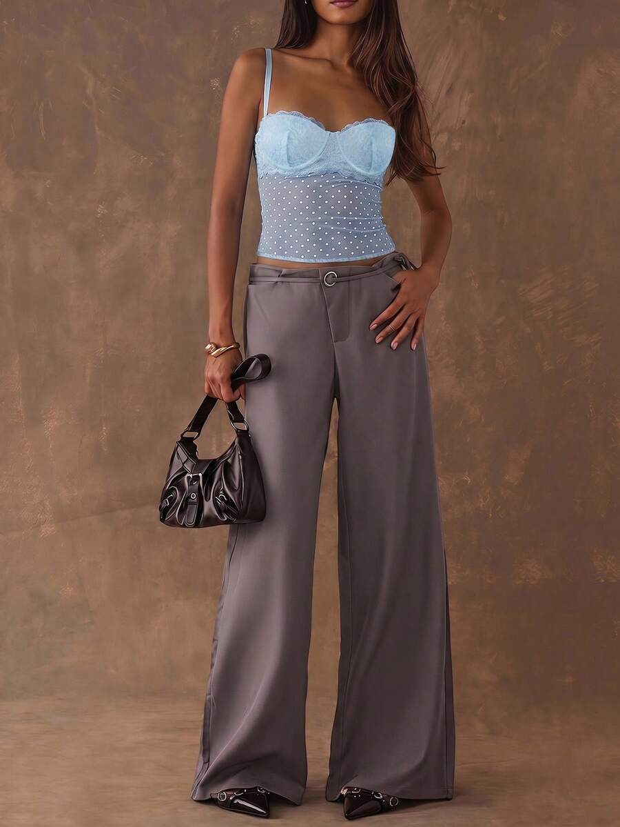 Women's black contrast lace camisole with spaghetti straps, cup detail, semi-sheer finish, and slim fit for going out or date night.