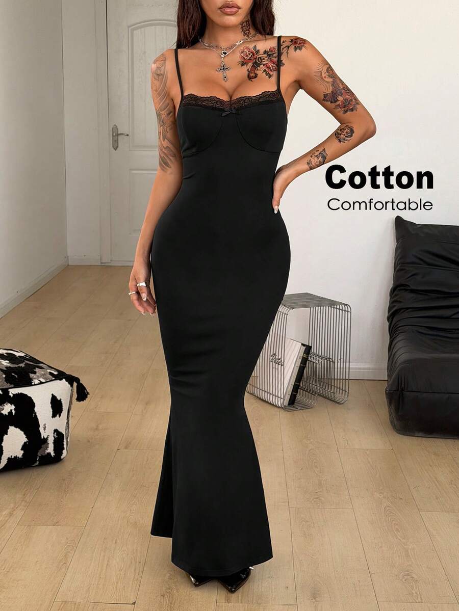 Black backless cami midi dress for women featuring spaghetti straps, slim fit mermaid silhouette, backless button detail, and high stretch knitted fabric.
