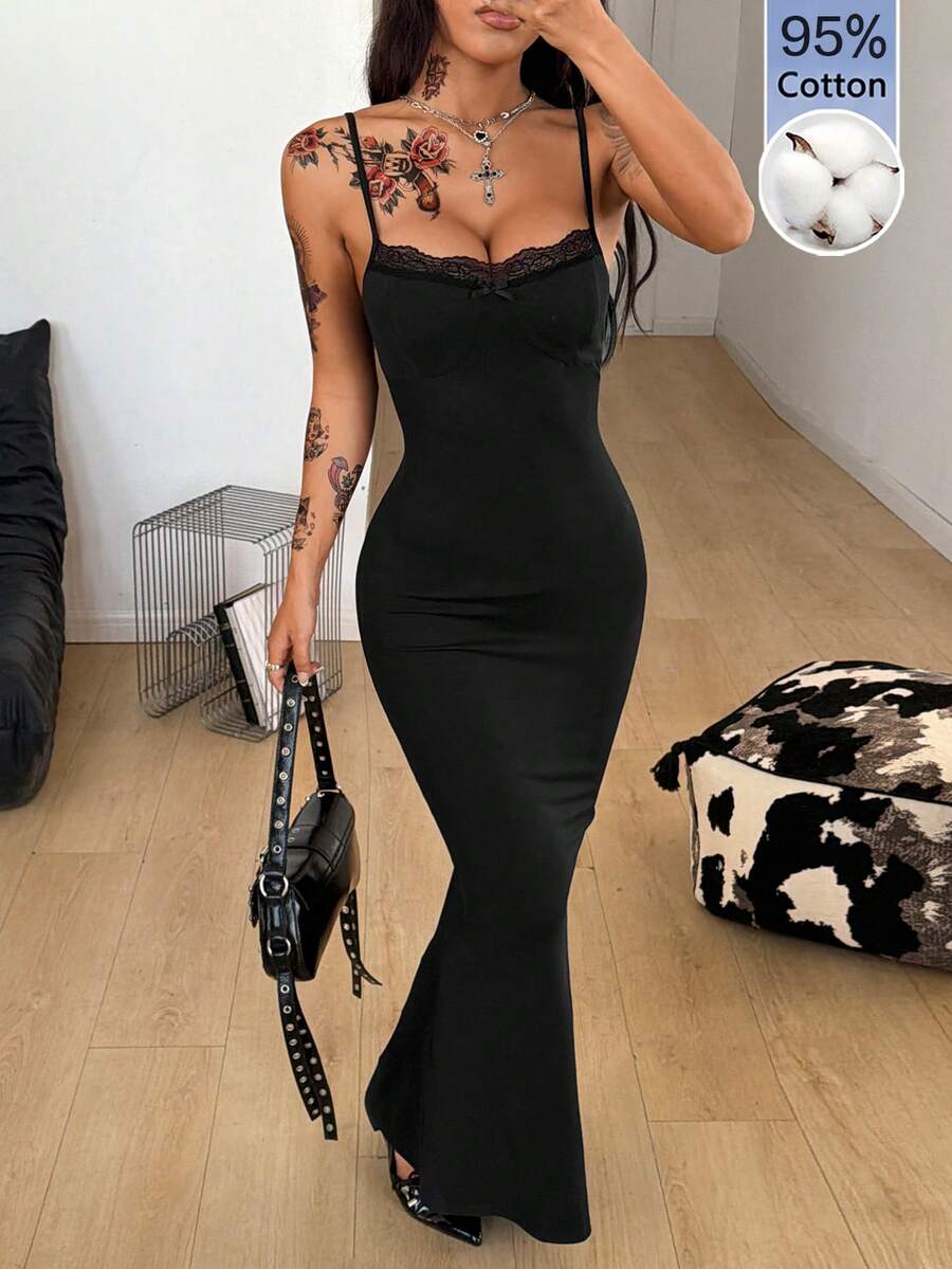 Black backless cami midi dress for women featuring spaghetti straps, slim fit mermaid silhouette, backless button detail, and high stretch knitted fabric.